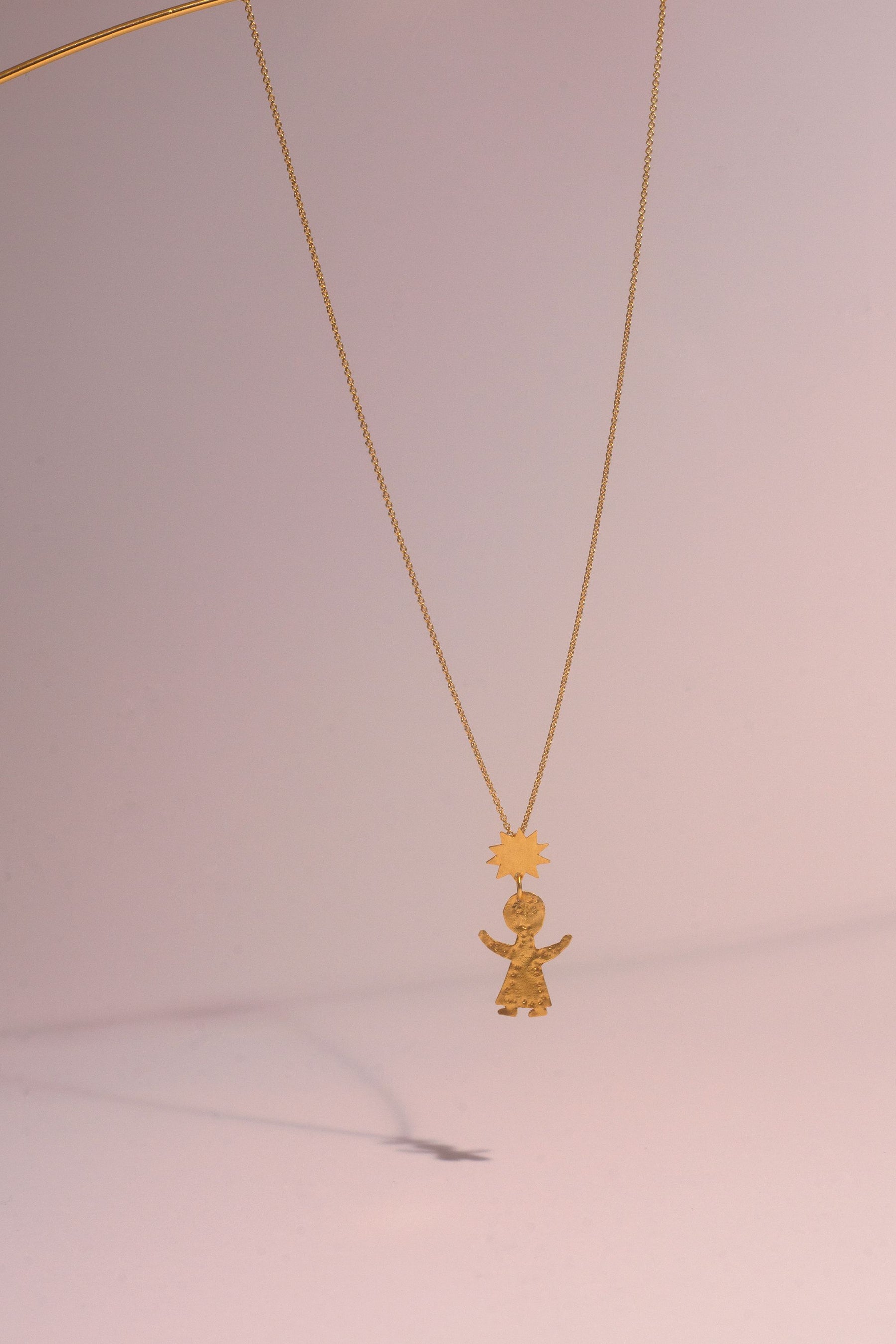 Figurine necklace